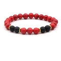 Detail of beaded bracelet with red marble texture, matte black beads and gold spacers - Red Net Stone