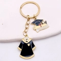Golden metal graduation keychain featuring black enamel robe and graduate scroll charm - GRADUATE Gown Doctor Hat Certificate Style (JE0922H)