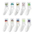 White crew socks with colorful street graffiti prints and urban fashion graphics - One Size / White