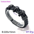 Oxidized black stainless steel men's bracelet featuring three gothic skull charms - Boiled Black Skull