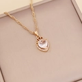 Close-up of gold crown heart pendant with large clear gemstone on beige jewelry pad - White (5#)