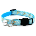 Blue pet collar with gold moon and star patterns, featuring a black cat buckle and bell - Lake Blue