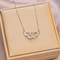 Elegant silver interlocking double heart necklace with sparkling zircon pavé setting - 6066 Double Heart Pendant / Silver