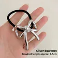 Silver metallic bow hair tie with black elastic rope and polished 4.5cm ornament - Bowknot Silver