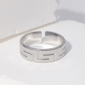Silver adjustable titanium ring featuring a classic Greek key pattern on a white pedestal - Steel Color-Greek Key