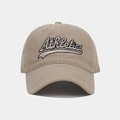 Detailed close-up of blue Athletics embroidery on khaki cotton vintage baseball cap - Khaki