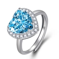 Elegant silver ring featuring a large heart-shaped blue zircon stone and halo crystals - Blue Zircon