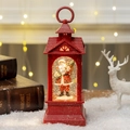 Rote Weihnachtslaterne mit Weihnachtsmann-Figur und glitzerndem Schneeeffekt - Roter Weihnachtsmann