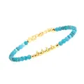 Macro detail of turquoise beads and gold-plated metal spacers on a fine adjustable bracelet - Apatite Snowflake Plate