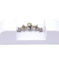 Sparkling stainless steel stud earrings with five curved clear crystals on a white stand - Zirconia Style
