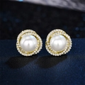 Exquisite pearl stud earrings with zircon flower wrap design in elegant gold setting - Gold