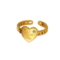 Detail of gold-plated heart ring with blue stone and Love You engraving - Gold Heart Love You