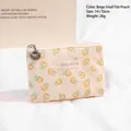 Compact beige lace makeup bag with yellow floral embroidery and shell zipper detail - Beige Flat Bag
