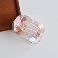 Macro detail of a rectangular acetate hair claw clip with colorful iridescent marble pattern - 8# Purple Red Floral Acetate Circular Claw