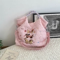 Pink quilted crossbody tote with cartoon dog embroidery and blue woven handle - Skateboard Dog Pink