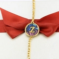 Golden Figaro chain bracelet with shell pendant featuring gold letter Z in gift box - Letter Z