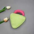 Green triangular quilted makeup bag with pink handle and tulip accents on grey background - Small / Green