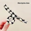 Large 11cm checkerboard hair claw clip in black and white acrylic for elegant styling - Hollow Cross Style (0312)
