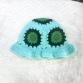 Handmade light blue crochet bucket hat with green floral patterns for women - M (56-58cm) / Patchwork Flower Lake Blue