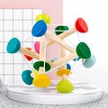 Colorful wooden baby grasping toy with elastic cords for sensory training on round stand - Large Elastic Grip Ball