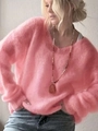 Close-up of pink V-neck mohair sweater with elegant long beaded necklace detail - S / Pink