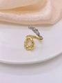 Unique 18k gold and silver liquid metal spiral open ring on white ceramic plate - Adjustable Open / Bi-color Ring A