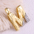 Gold plated letter N charm with micro-set zircons on white coral stone texture - Pendant Only / Letter: M