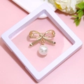 Elegant golden butterfly brooch with white pearl pendant in a square frame - XZ190-Bowknot Pearl-Boxed