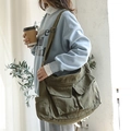 Olive green canvas messenger bag with large capacity and double front pockets for women - Green