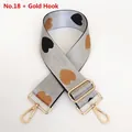 Close-up of thick nylon bag strap with heart jacquard pattern and gold swivel hooks - No. 18 + Gold Hook (Grey with Black/Brown Heart)