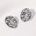 Polished silver irregular metal stud earrings with organic texture and cutout detail - Steel