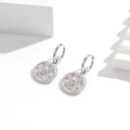Silver stainless steel hoop earrings with sunburst circular pendant and zircon detail - Silver / White Zirconia