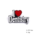 Detailed view of an I Love Dentistry enamel pin showing dimensions 4.4x2.8cm and weight 9.33g - Dentistry Style