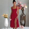 Detail of red slim fit sling dress featuring high slit and ruched bust design - S / Red
