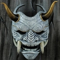 Japanese Hannya Oni mask with golden horns and white fangs in weathered wood finish - Resin / Large Grey Hannya