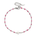 Macro detail of stainless steel bracelet with pink beads and a silver cross charm - Rose Pink