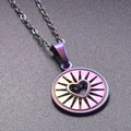 Macro shot of rainbow-plated stainless steel round pendant with hollow heart detail - Rainbow Color Necklace