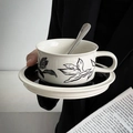 Vintage ceramic coffee cup and saucer set with black leaf patterns and metal spoon - Black Lily