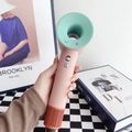 Handheld bladeless hair dryer in pink and green finish with ionic technology - Macarons