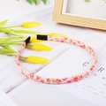 Charming pink floral patterned headband for girls with a comfortable fabric-covered design - Pink Floral