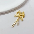 Golden bow pendant necklace with micro-pave zircons and dangling tassel charms - Pearl Tassel Bow / Gold