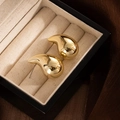 Elegant gold teardrop metal stud earrings displayed in a luxury jewelry box - Gold Large Water Drop