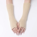Close-up of beige ribbed knit arm warmer with functional fingerless design for warmth - Beige
