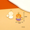 Detail of Halloween pumpkin girl charms showing front enamel craft and back metal texture - Pumpkin Lantern Man