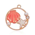 Pink marine charm with red scallop shell, starfish, and pearls in gold circular frame - Pink Starfish Large Shell