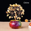 Golden citrine crystal money tree with lucky basin on a rustic wooden table - Citrine