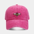 Close-up of fine bee embroidery on washed cotton fabric of a pink baseball cap - Rose Red