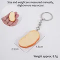 Realistic PVC bread slice keychain model with detailed whole wheat texture and metal ring - 4.6cm Bread Slice with Keychain