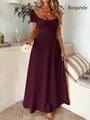 Elegante abito lungo viola con spalle scoperte, maniche a sbuffo e dettaglio in vita - Taglia S / viola-rosso