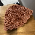 Handcrafted caramel straw sun hat with crochet hollow pattern and wavy brim design - M / Lace-Orange